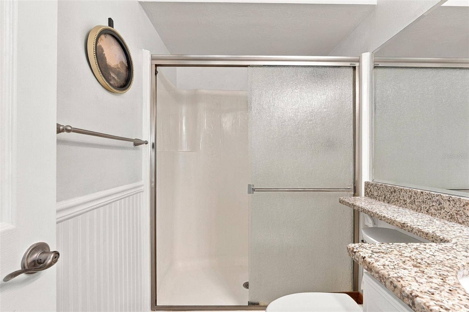 12538 SW KINGSWAY CIRCLE, #1008, Lake Suzy, FL 34269 Spacious Walk-In Shower with Granite Top Vanity