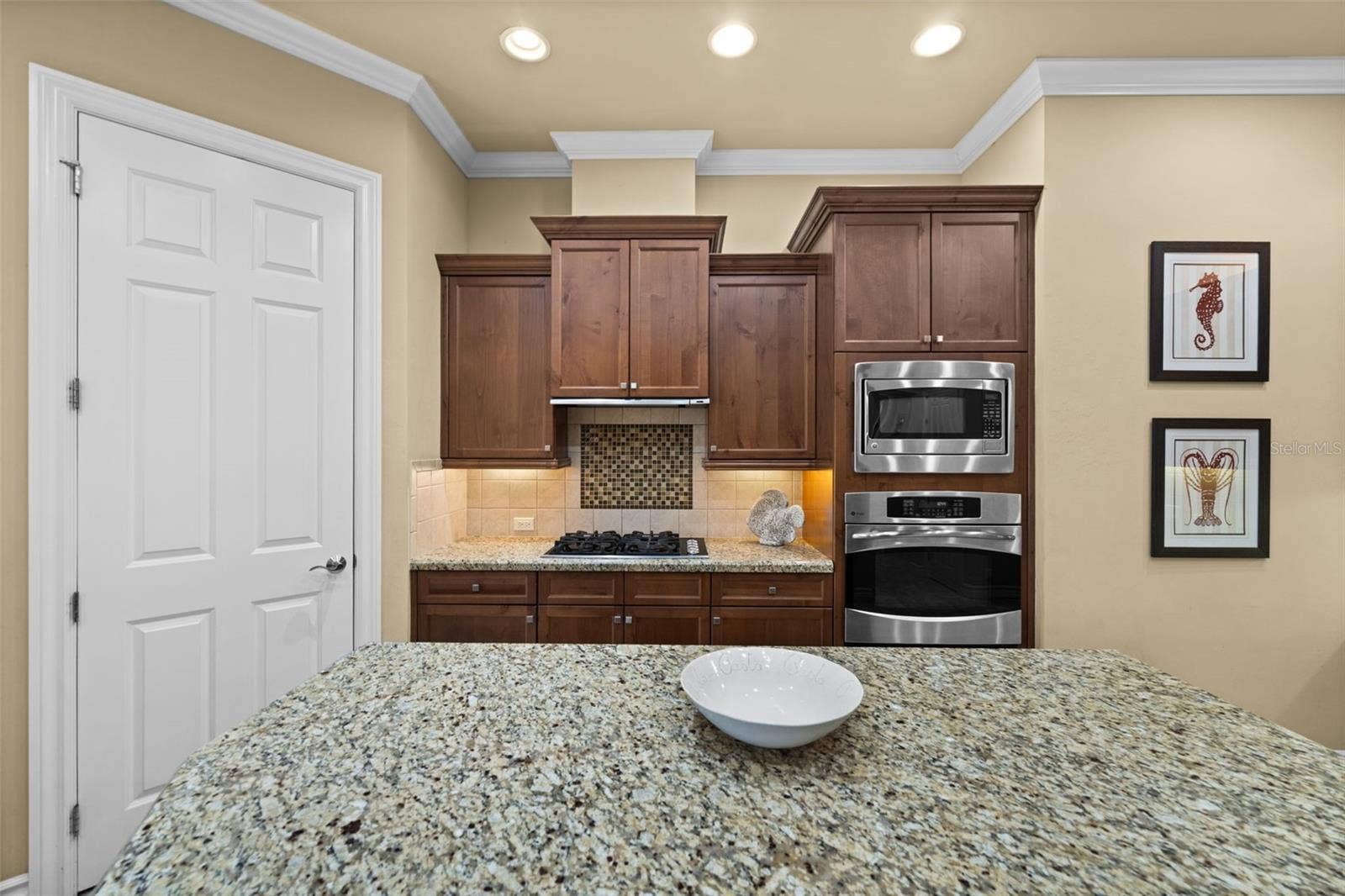 Looking toward the gas cooktop and built in wall oven