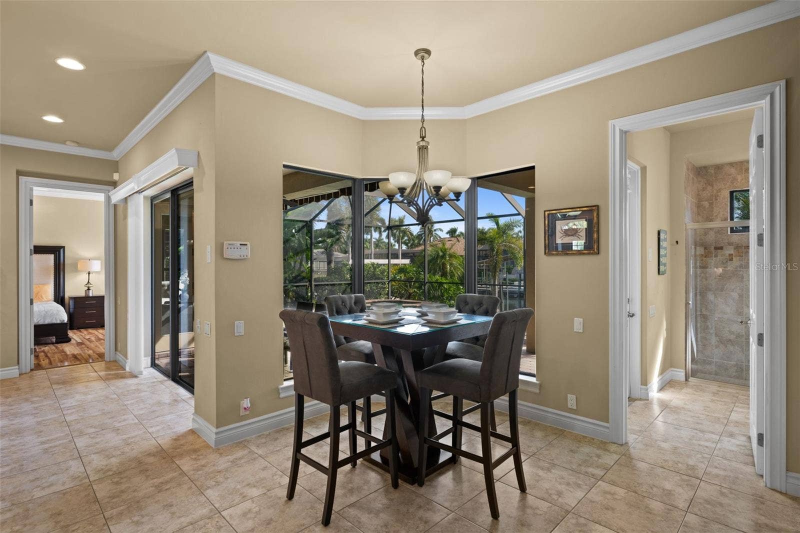 Casual breakfast area and guest/pool bath