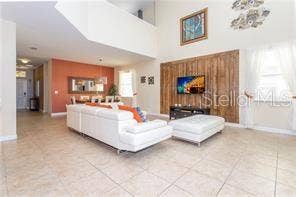8985 CUBAN PALM RD. ROAD, Kissimmee, FL 34747 living room/Staged