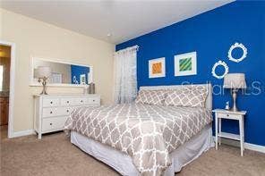 8985 CUBAN PALM RD. ROAD, Kissimmee, FL 34747 primary bedroom/Staged