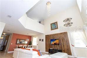 8985 CUBAN PALM RD. ROAD, Kissimmee, FL 34747 living room/Staged