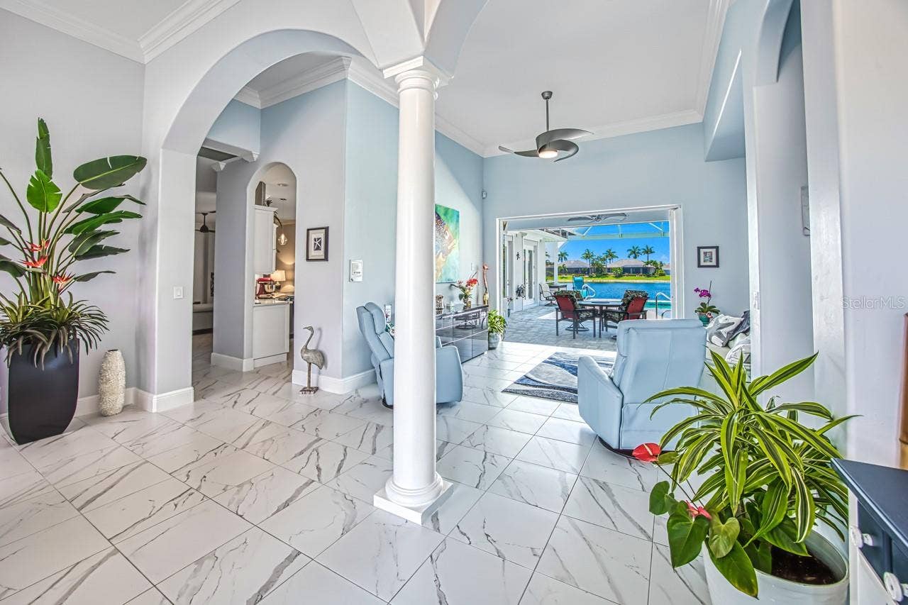 8625 SOUTHWIND BAY CIRCLE, Fort Myers, FL 33908 Entry opens to Living Room and lanai