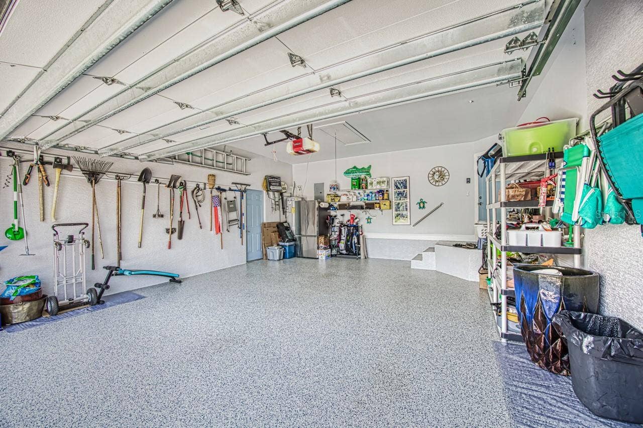 8625 SOUTHWIND BAY CIRCLE, Fort Myers, FL 33908 Custom Epoxy coated floor
