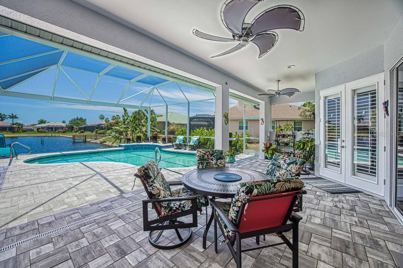 8625 SOUTHWIND BAY CIRCLE, Fort Myers, FL 33908 Covered lanai with hurricane protection