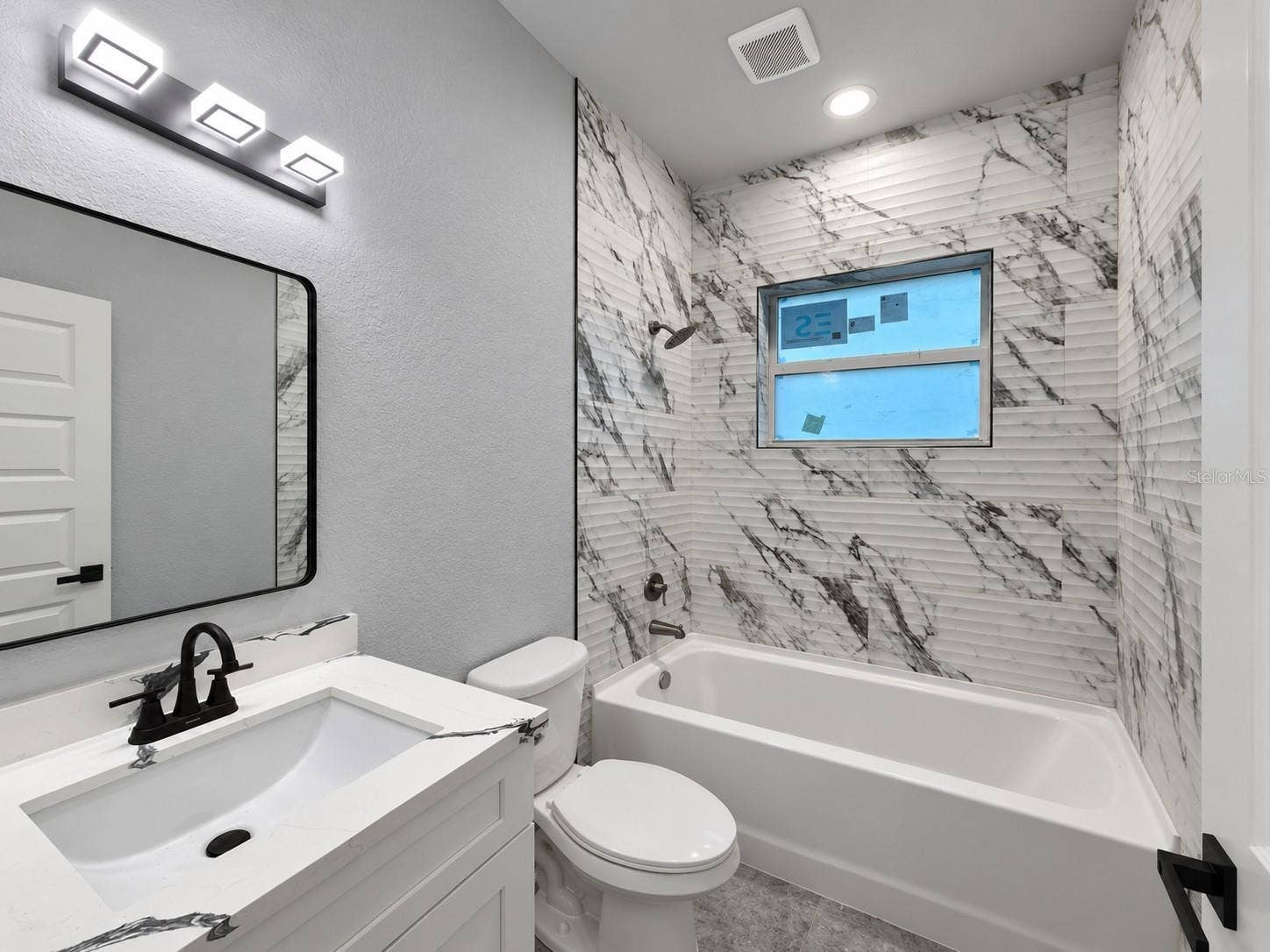 2484 PICKARD LANE, North Port, FL 34286 Guest Bath with beautiful tile