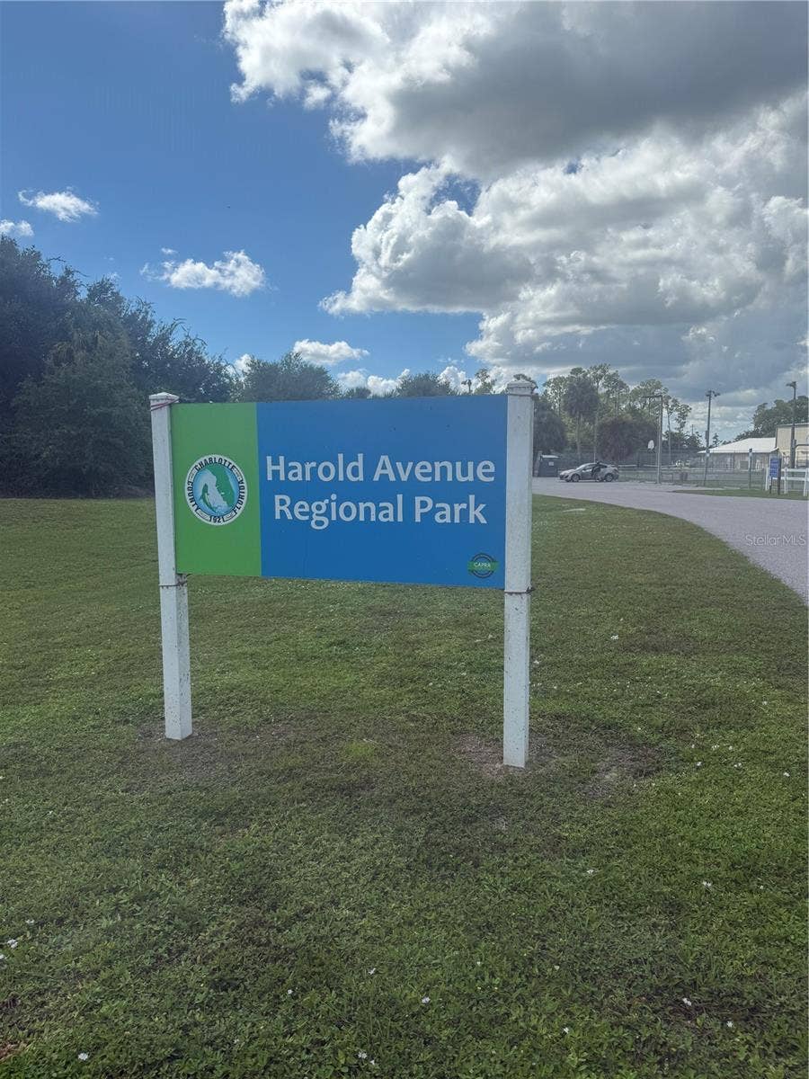 1213 BLALOCK STREET, Port Charlotte, FL 33980 8 minute walk to this well equipt park with basketball and pickleball courts and children's rides.