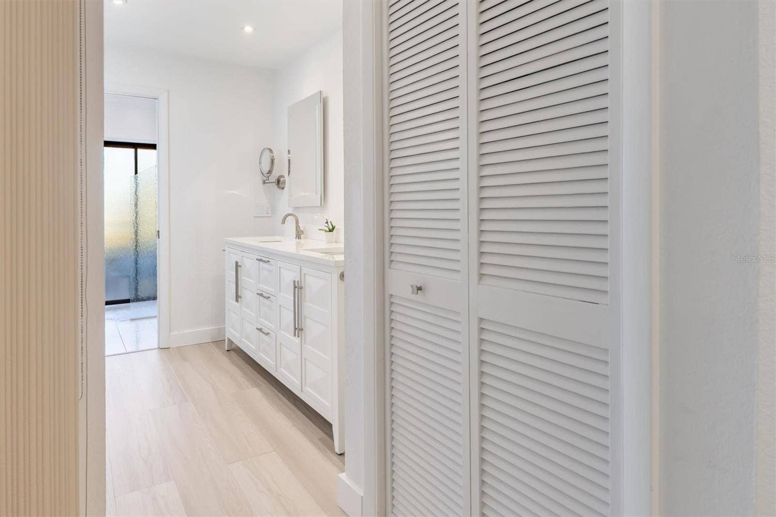 5021 SAN ROCCO COURT, Punta Gorda, FL 33950 Linen closet and primary bath