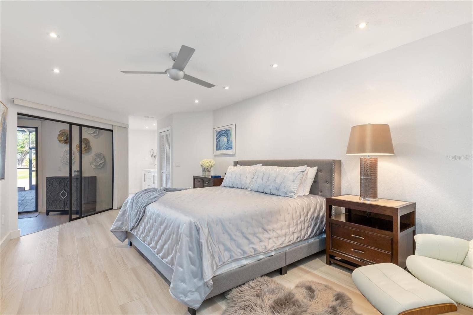 5021 SAN ROCCO COURT, Punta Gorda, FL 33950 Spacious bedroom with ensuite bath at end