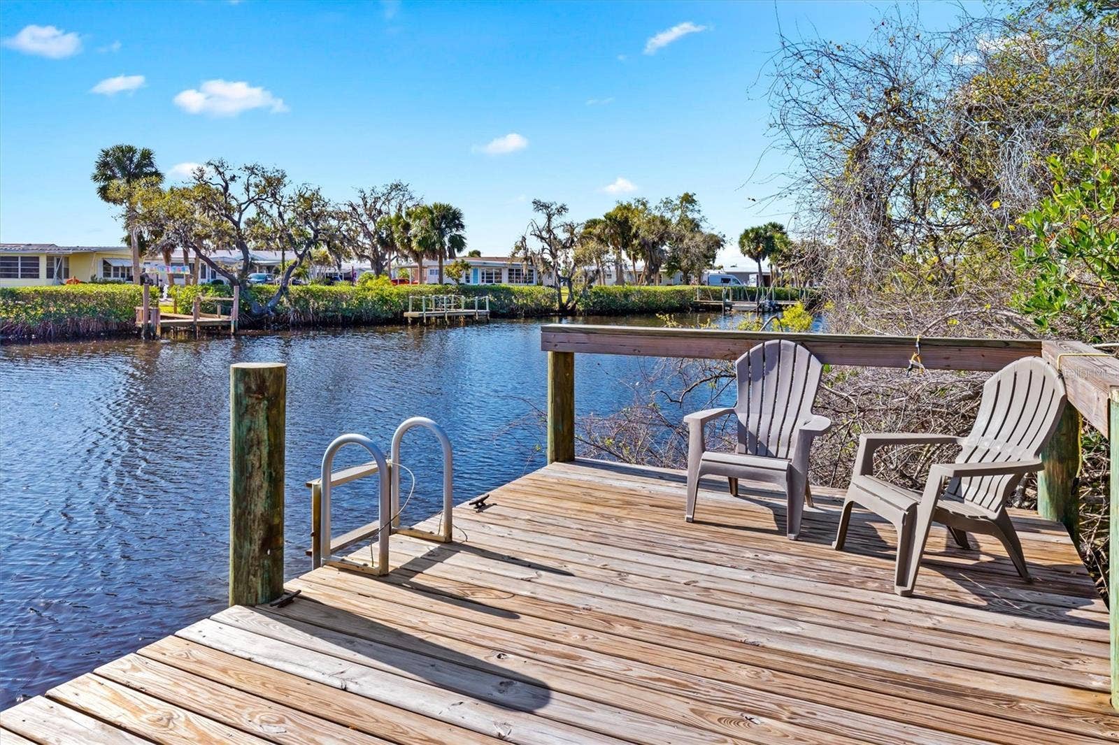5021 SAN ROCCO COURT, Punta Gorda, FL 33950 Community dock. Relax with your favorite beverage.