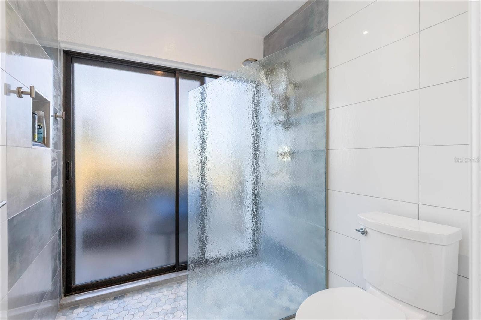5021 SAN ROCCO COURT, Punta Gorda, FL 33950 Glass shower and slider to lanai. Handy access for your hot tub.
