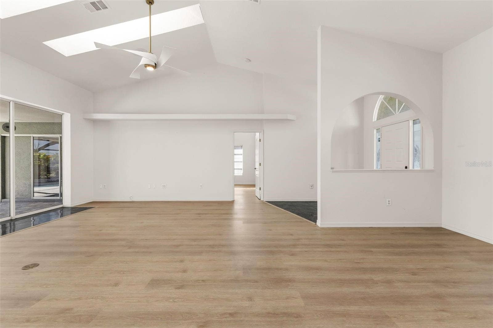 5184 ELLSWORTH TERRACE, Port Charlotte, FL 33981 Living room and formal dinning/flex space