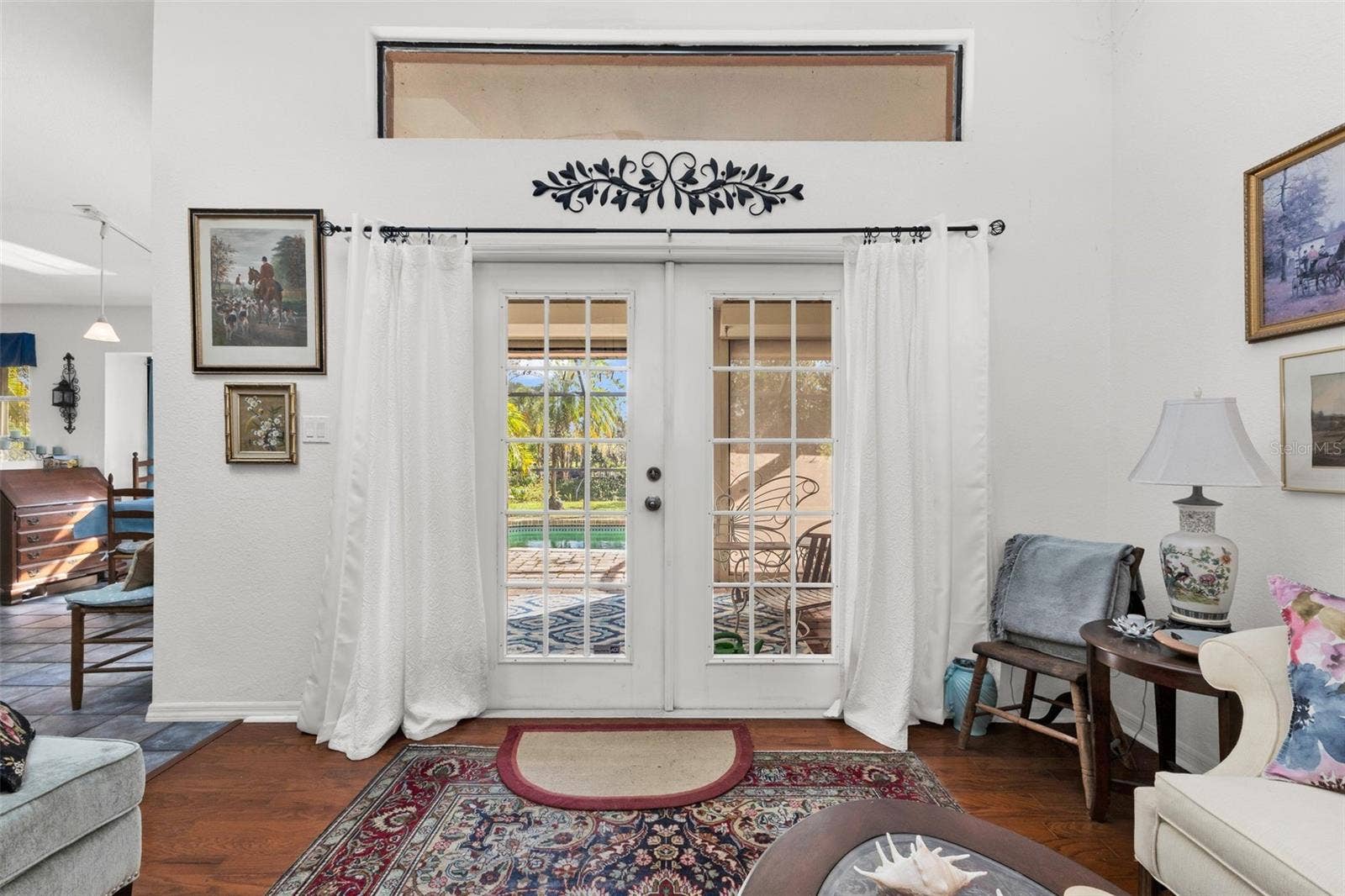 1360 INVERNESS STREET, Port Charlotte, FL 33952 FORMAL LIVING ROOM WITH FRENCH DOORS