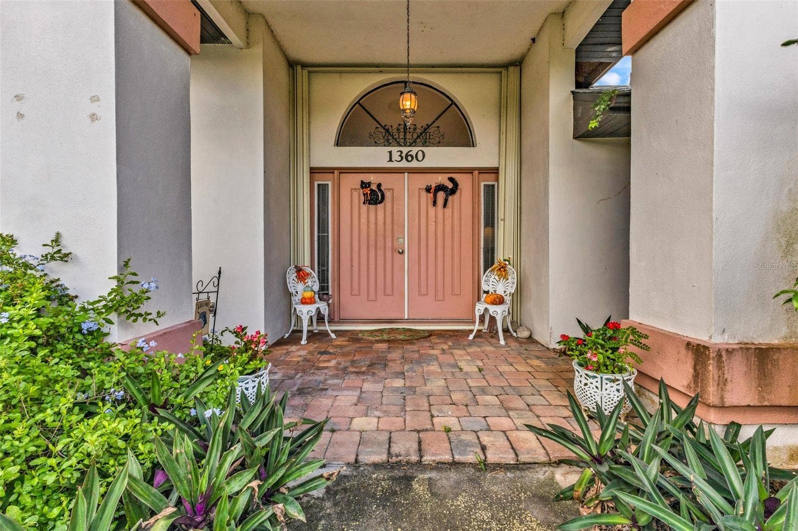 1360 INVERNESS STREET, Port Charlotte, FL 33952 OUTSIDE ENTRANCE WITH DOUBLE DOORS