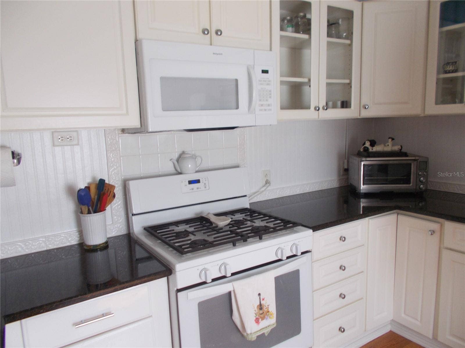 Kitchen showing gas stove