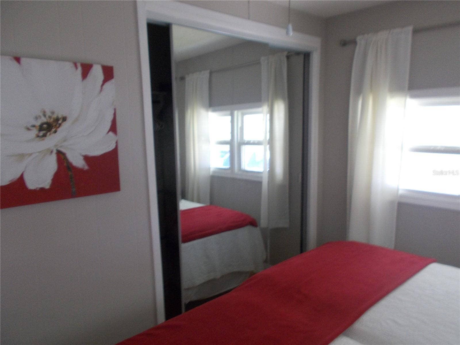 Bedroom #2 with mirrored closet