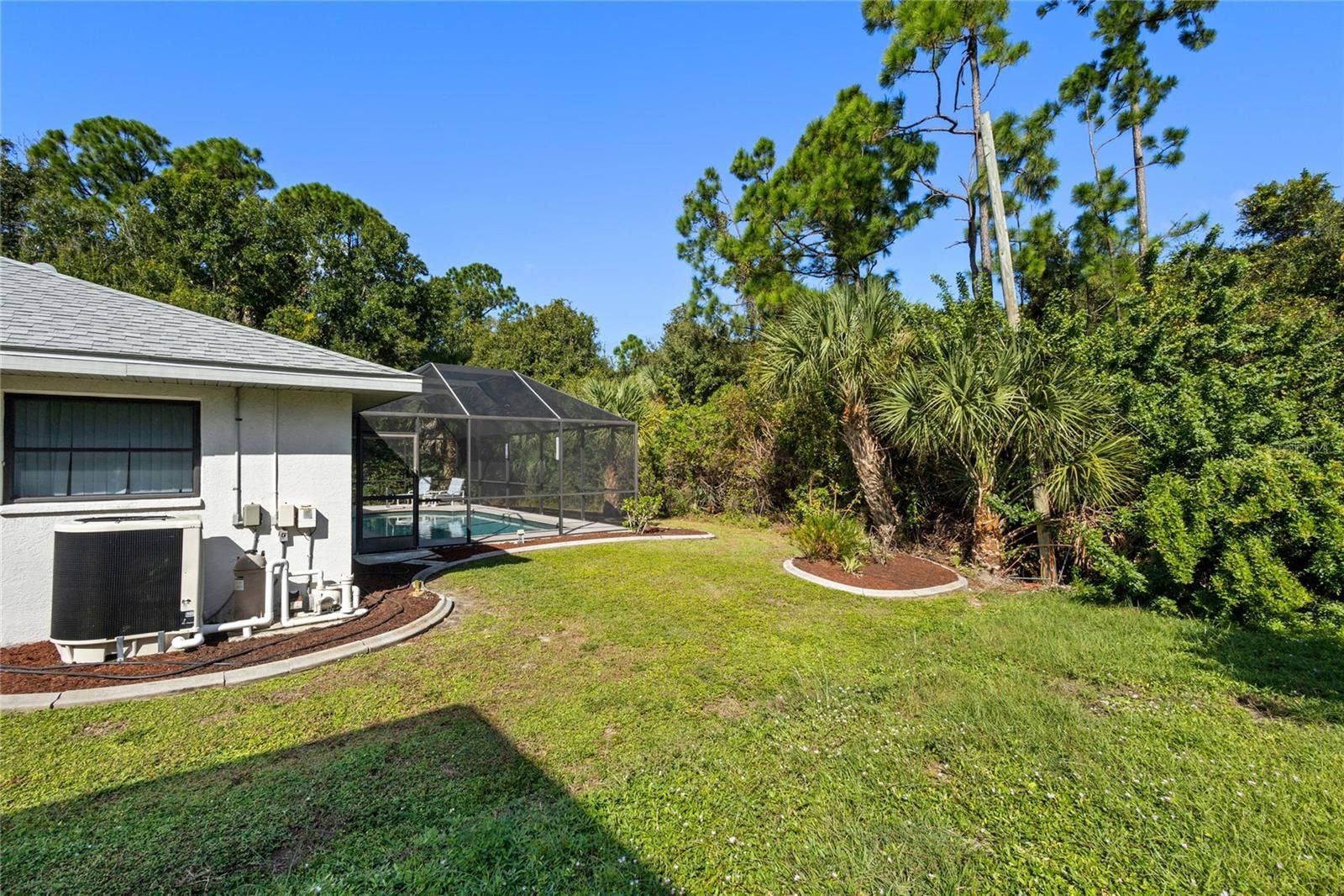 18346 KOALA AVENUE, Port Charlotte, FL 33948 Side yard.