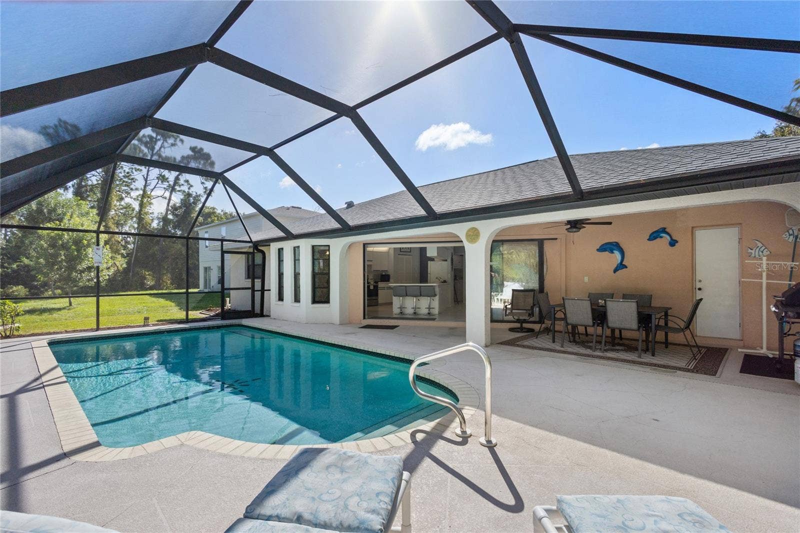 18346 KOALA AVENUE, Port Charlotte, FL 33948 Swim, relax or entertain your friends and family.