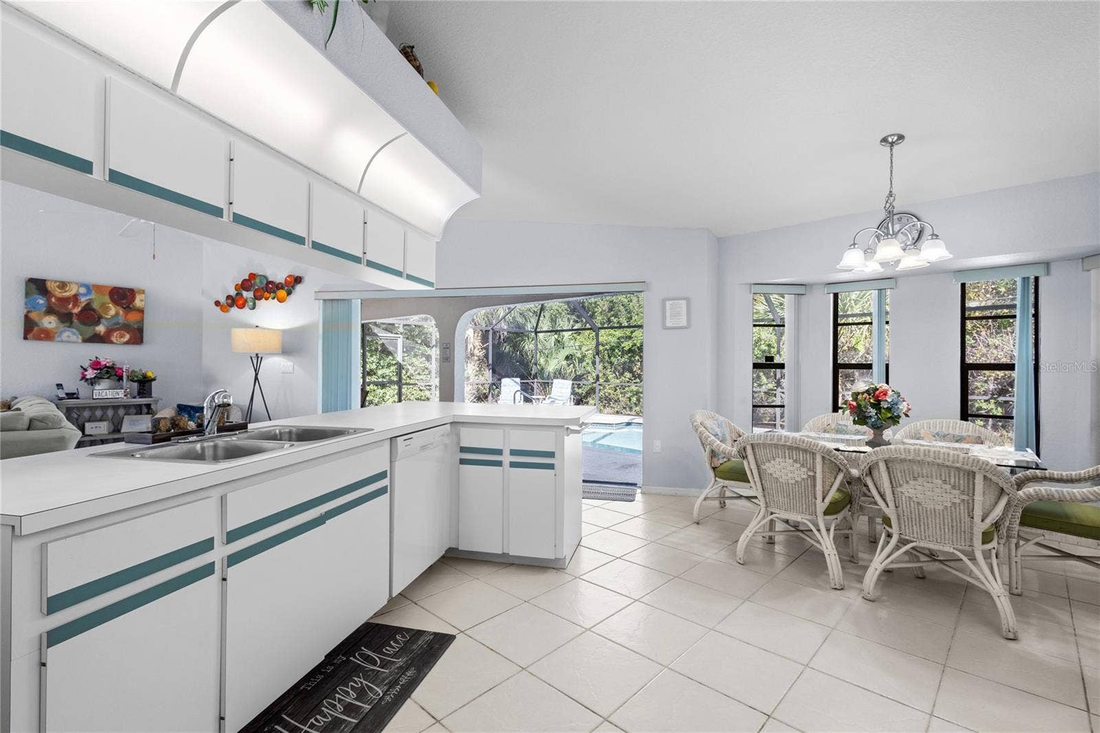 18346 KOALA AVENUE, Port Charlotte, FL 33948 Large Kitchen with view of the pool.