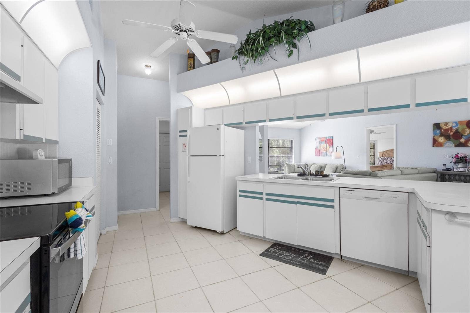 18346 KOALA AVENUE, Port Charlotte, FL 33948 Ample cabinet and counter space.