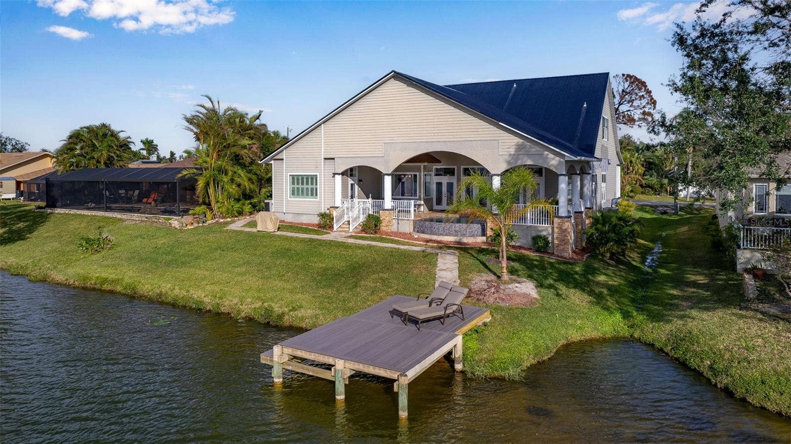 197 ALBERT LANE, Port Charlotte, FL 33954 Dock for suntanning or fishing.