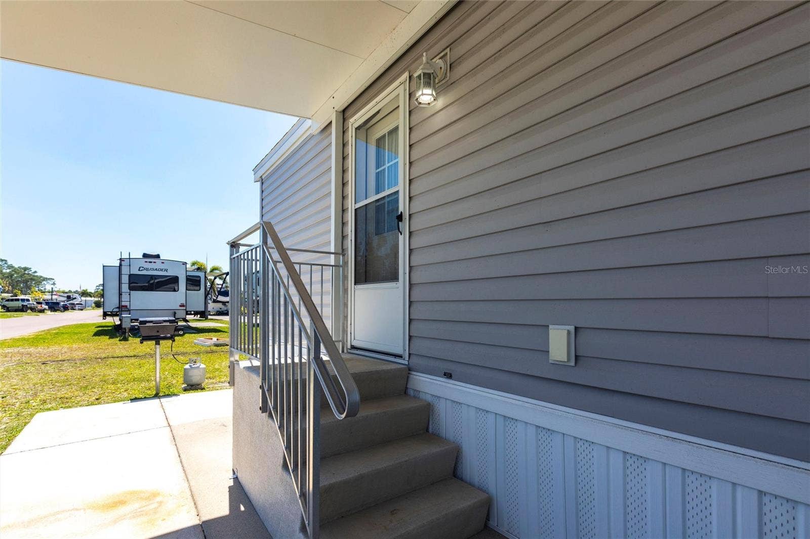 1329 TROUT, Punta Gorda, FL 33950 Covered entrance to home