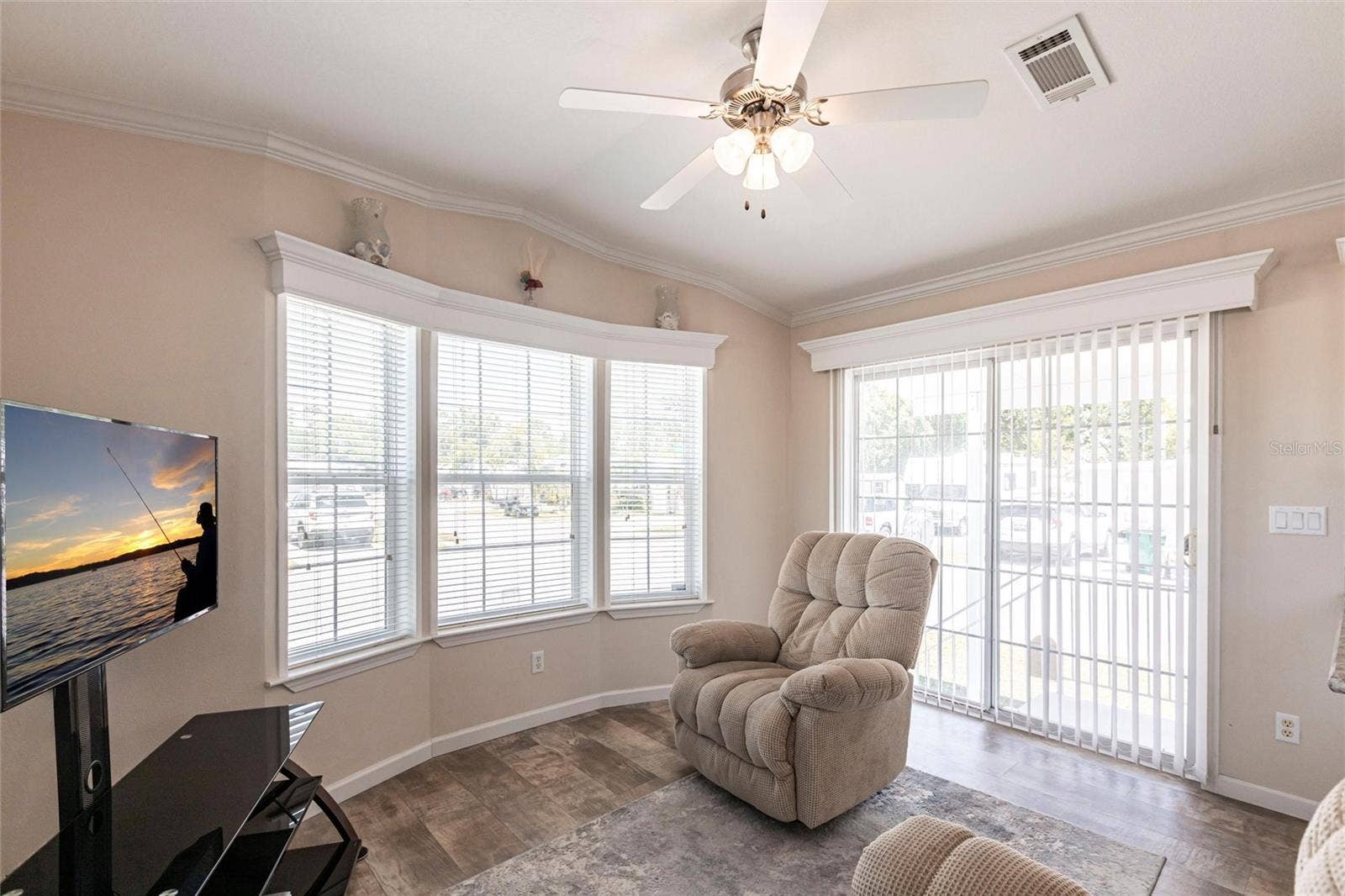 1329 TROUT, Punta Gorda, FL 33950 Living area and sliding door to covered patio