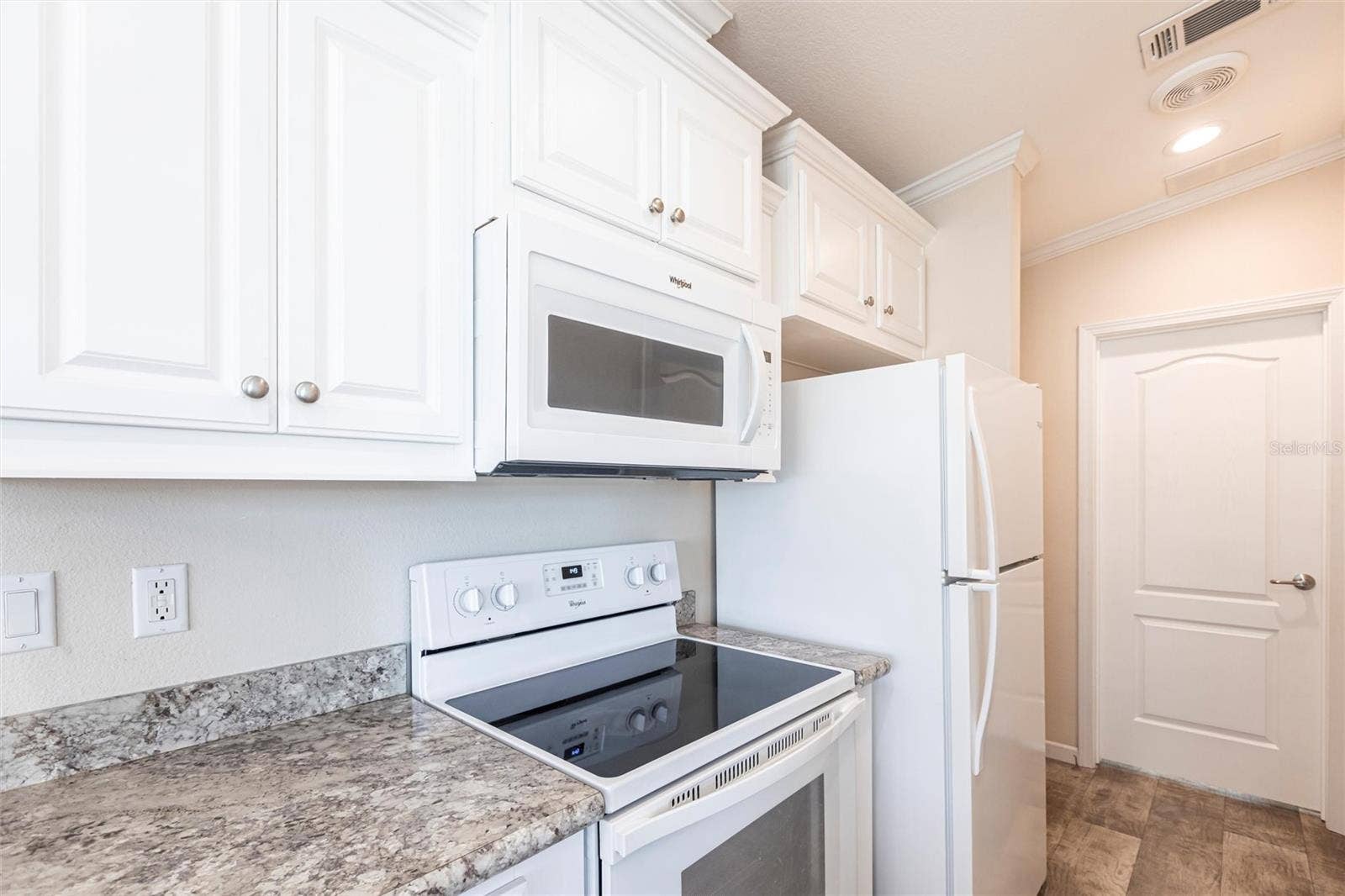 1329 TROUT, Punta Gorda, FL 33950 Kitchen stove and microwave