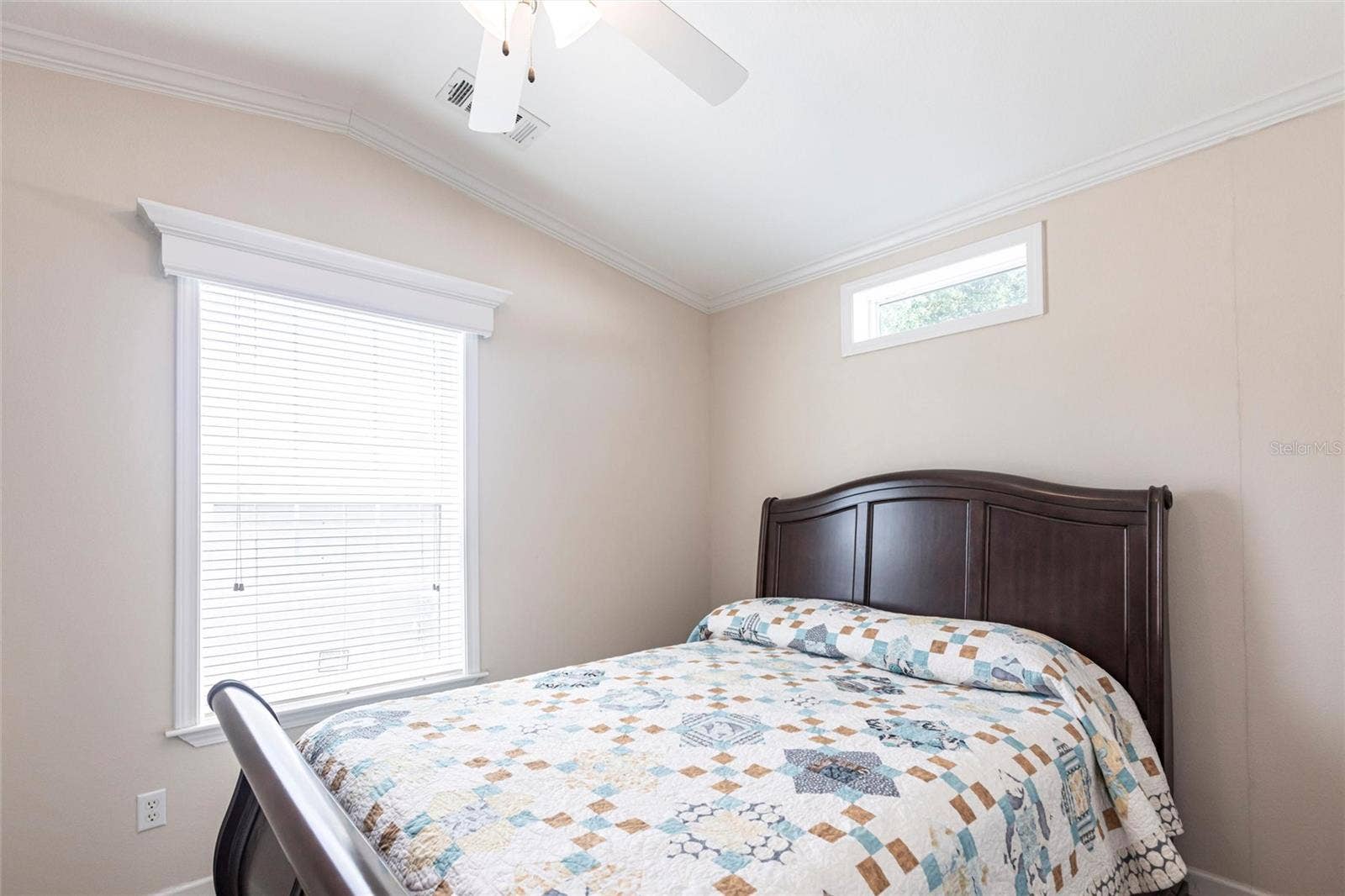 1329 TROUT, Punta Gorda, FL 33950 Bedroom with windows and ceiling fan