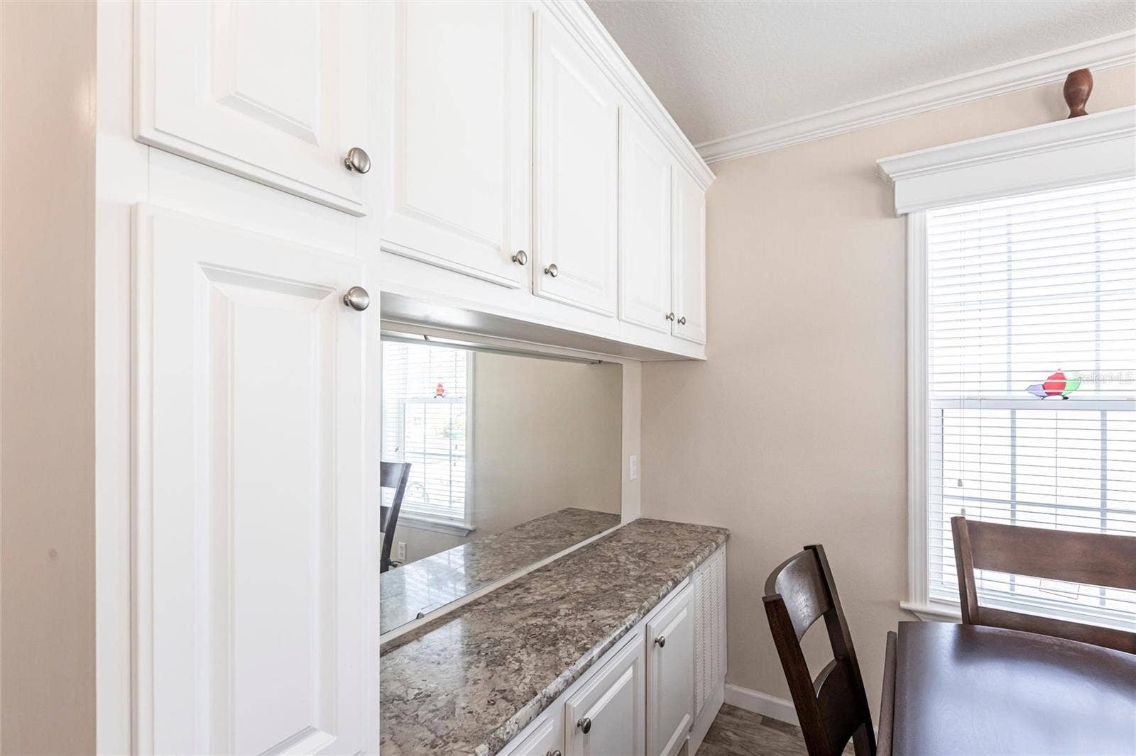1329 TROUT, Punta Gorda, FL 33950 Added cabinets dry bar area
