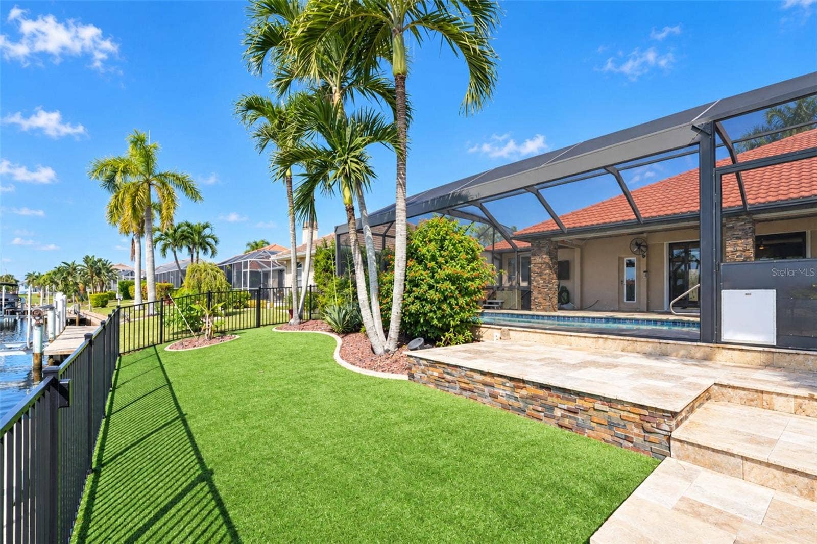 321 PALM ISLES CT, Punta Gorda, FL 33950 Backyard with sundeck