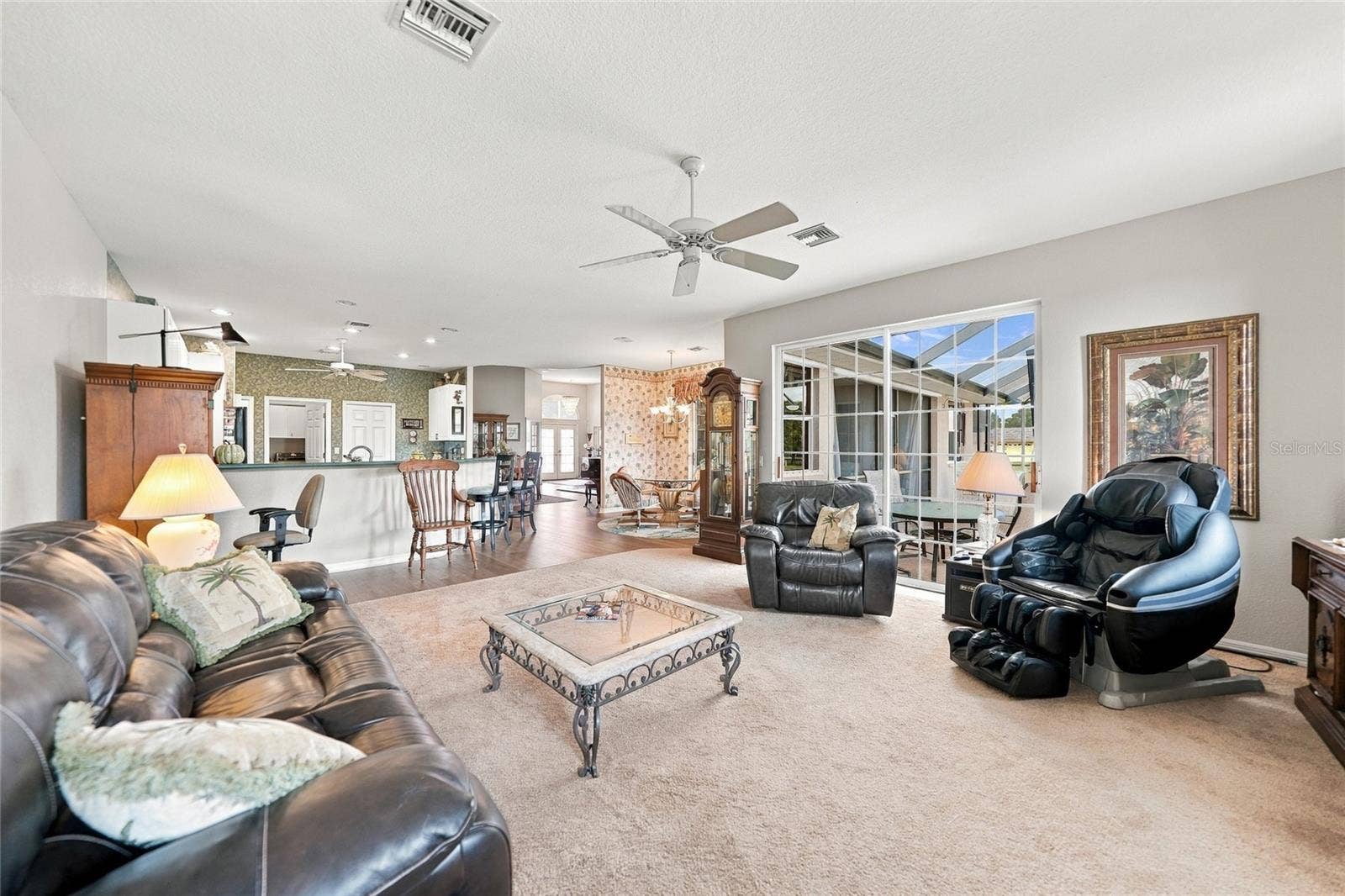 Family Room with New Carpet, Entrance to Pool
