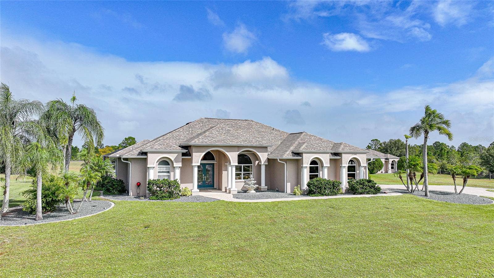 One Owner - Custom Built. Gated Entry, Paver Drive