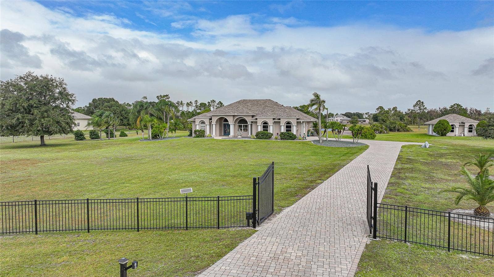 One Owner - Custom Built. Gated Entry, Paver Drive