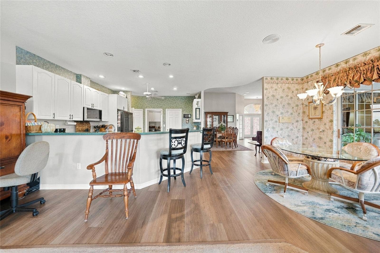 NEW Flooring, Breakfast Bar and Eating Nook with Entrance to Lanai