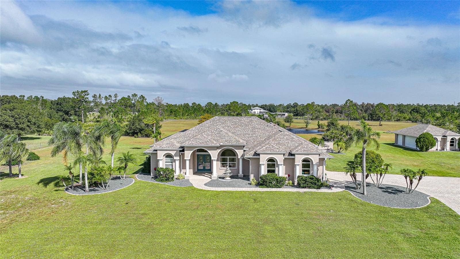 One Owner - Custom Built. Gated Entry, Paver Drive