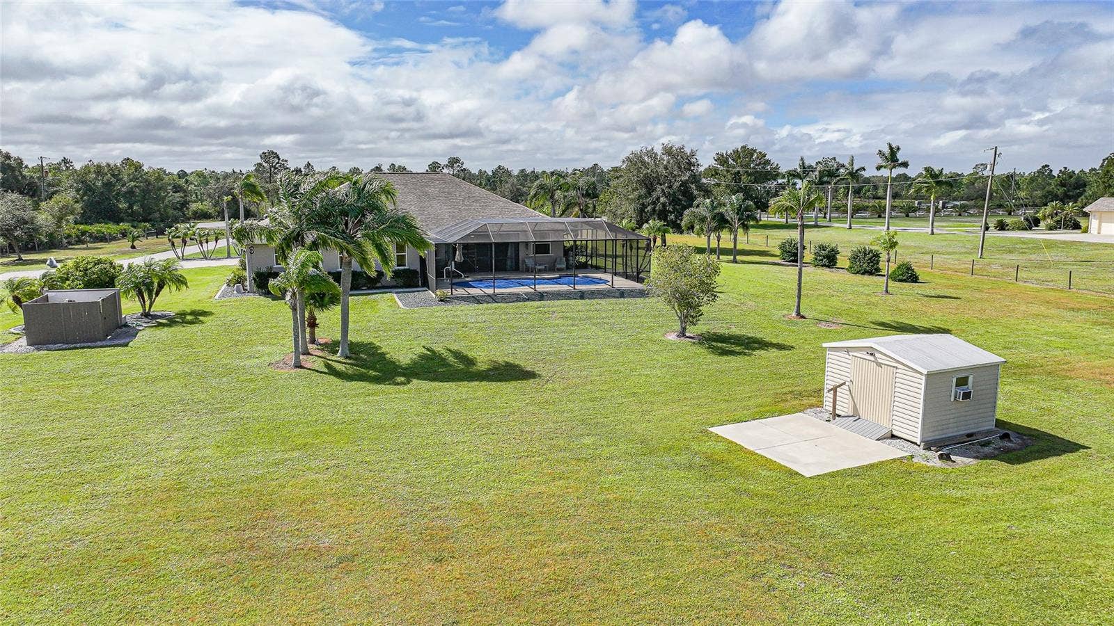 Home with 6.39 Acres, In-Ground Pool, Shed with Patio and Electric