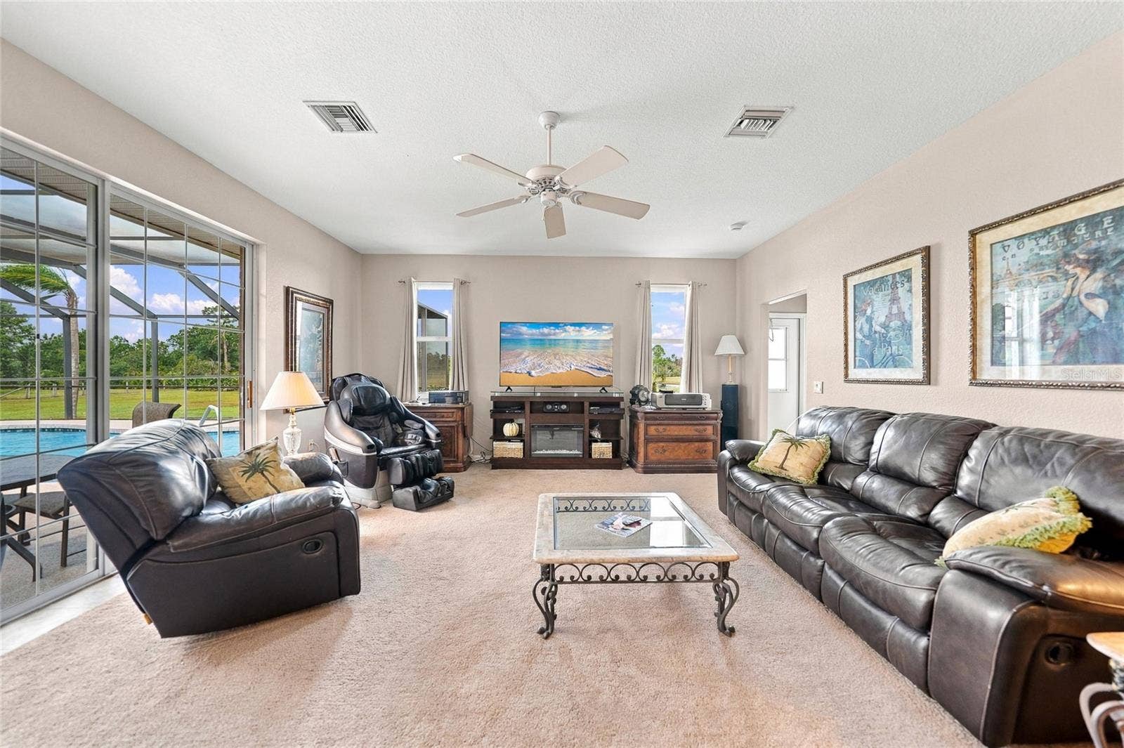 Family Room with New Carpet, Entrance to Pool