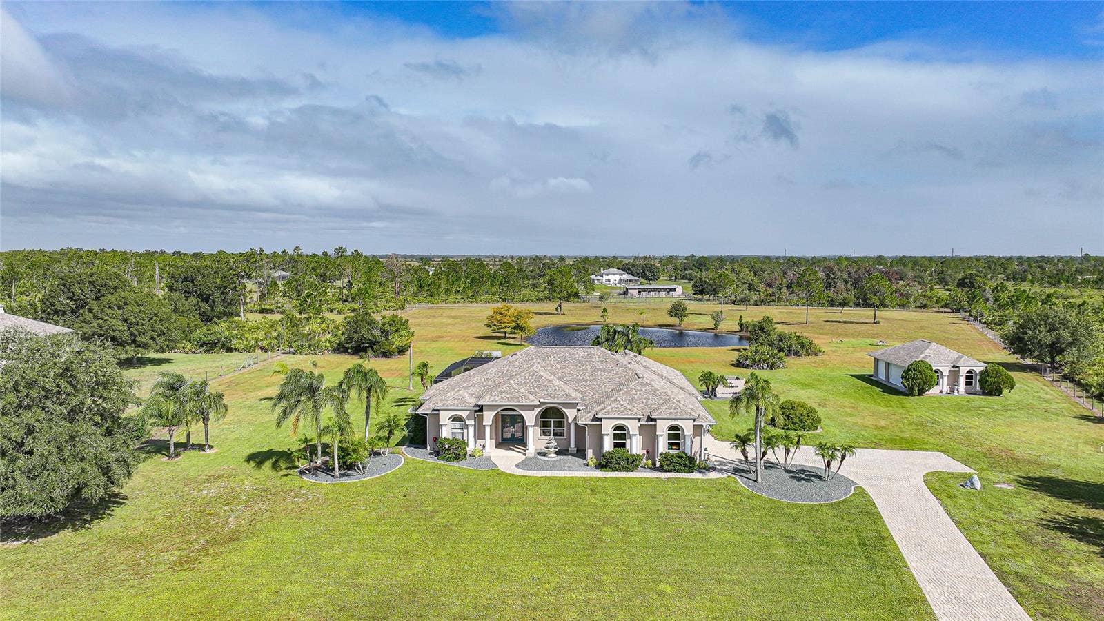 One Owner - Custom Built. Gated Entry, Paver Drive