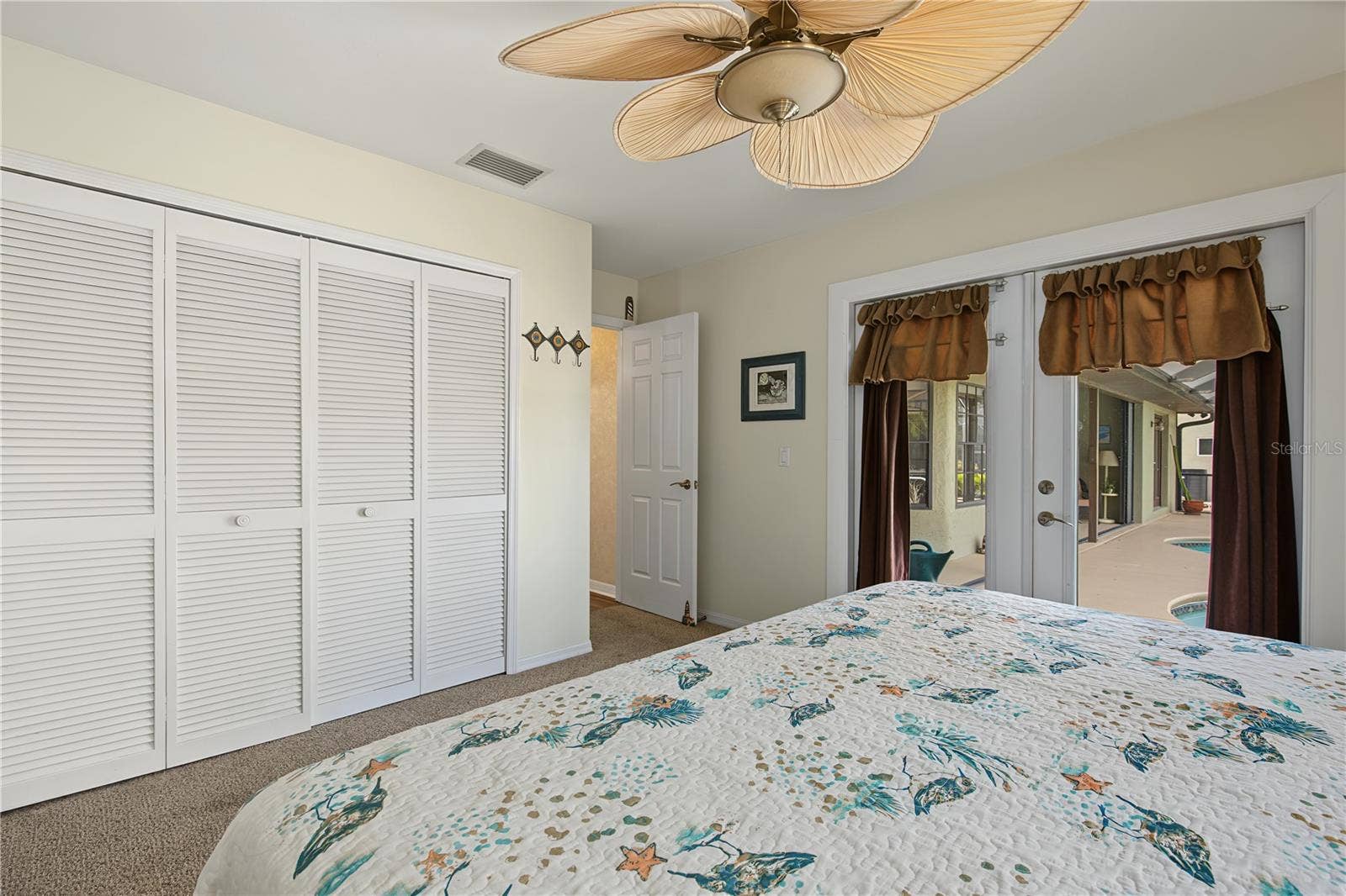 7121 TWIN EAGLE LANE, Fort Myers, FL 33912 Second bedroom with pool/lanai access