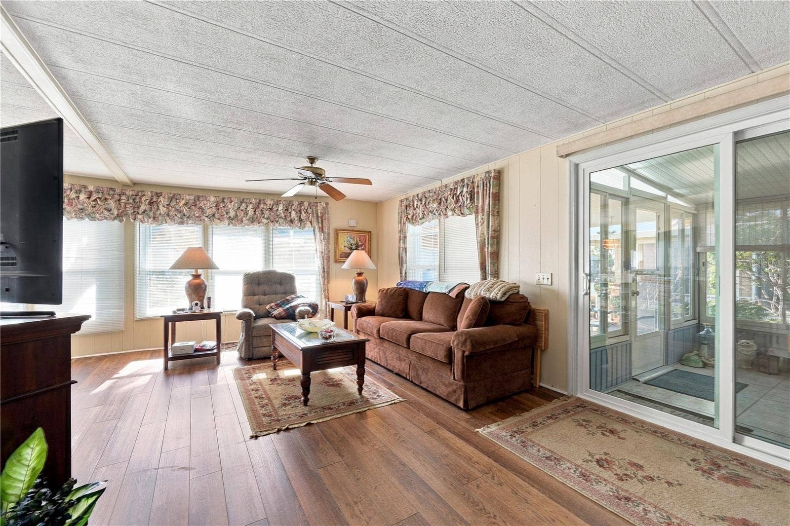 Living Room with sliding glass doors to Lanai