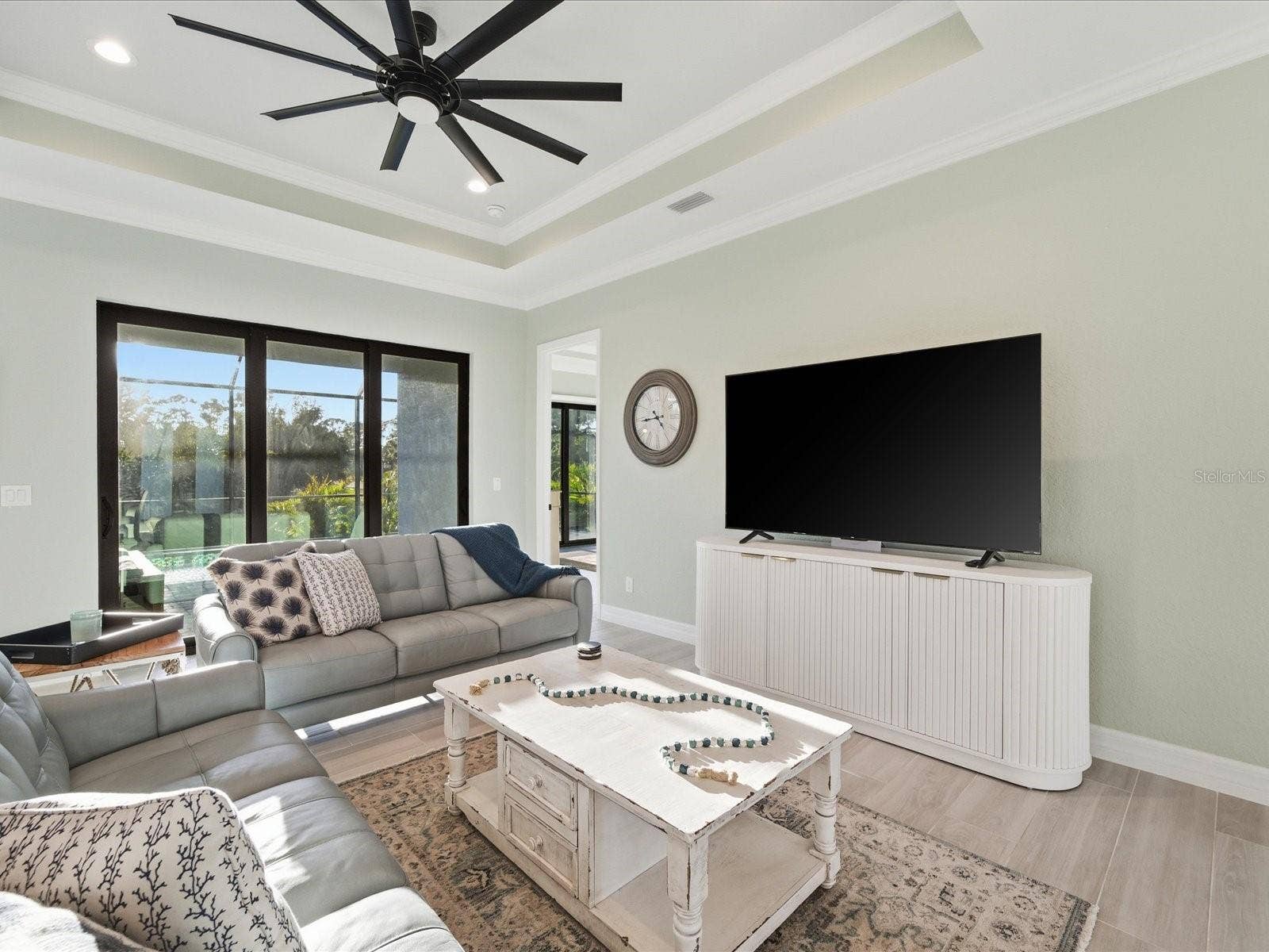 149 LONG MEADOW LANE, Rotonda West, FL 33947 Living Room with lovely tray ceiling