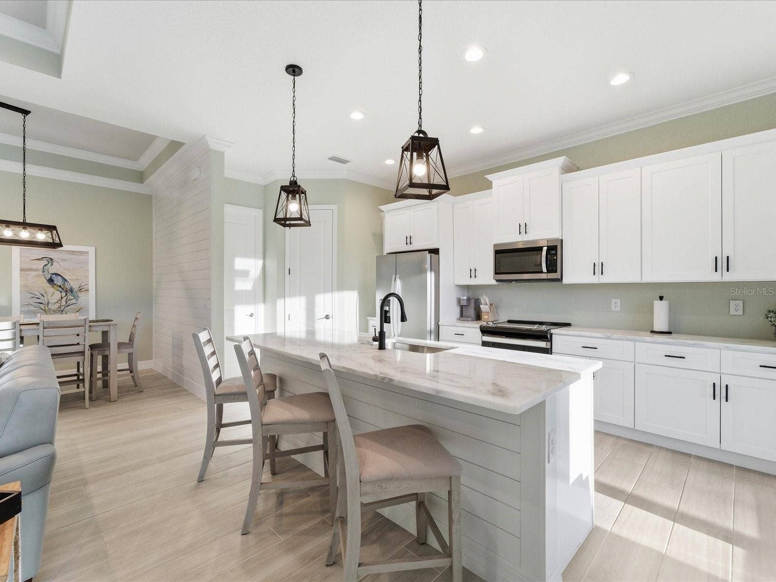 149 LONG MEADOW LANE, Rotonda West, FL 33947 Kitchen with solid wood soft-close cabinetry and high end Granite