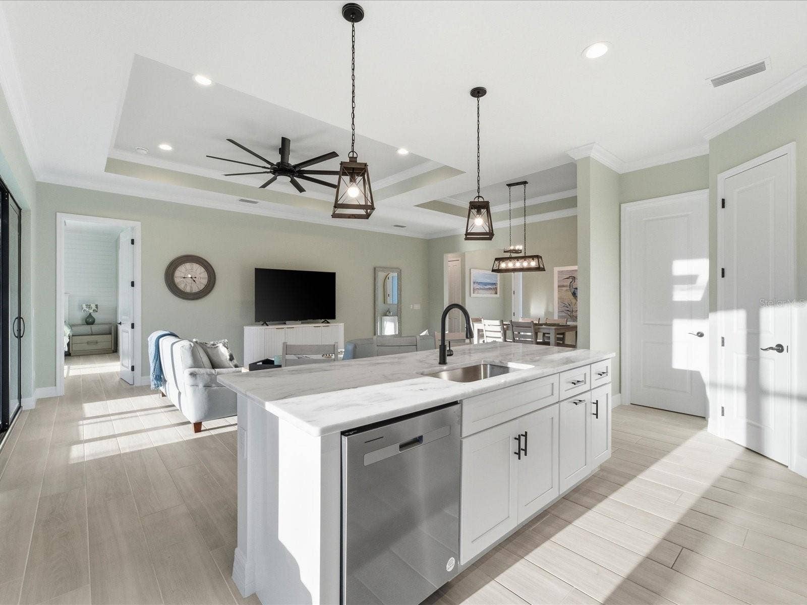 149 LONG MEADOW LANE, Rotonda West, FL 33947 The gorgeous granite topped working island overlooks the Living Room for fantastic entertainment space