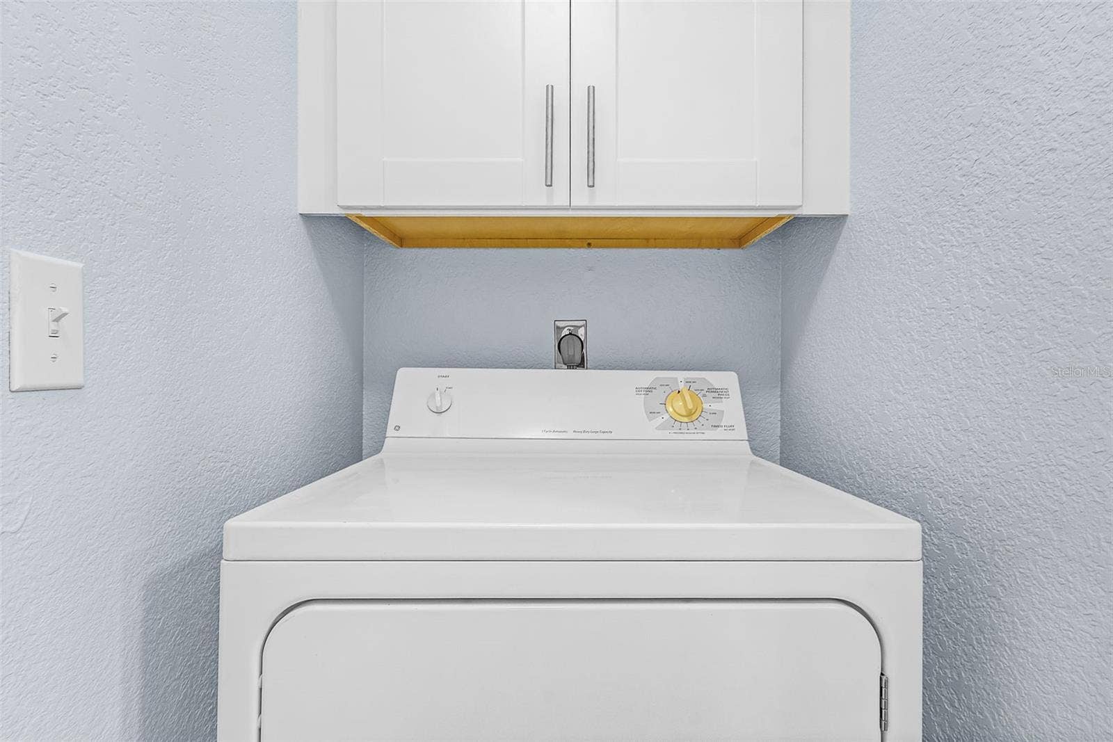 Off the kitchen laundry