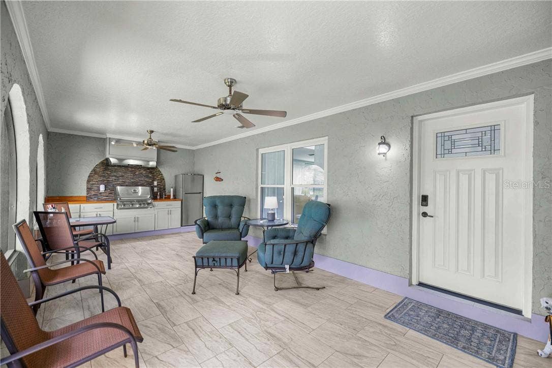 12014 W Dolphin COURT, Homosassa, FL 34448 front entry patio, beautifully done with outdoor kitchen/grill space