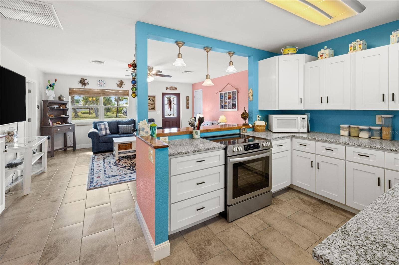 7035 DUKE STREET, Englewood, FL 34224 It's a "cook's kitchen". Well designed and organized with stone counters and updated cabinetry.