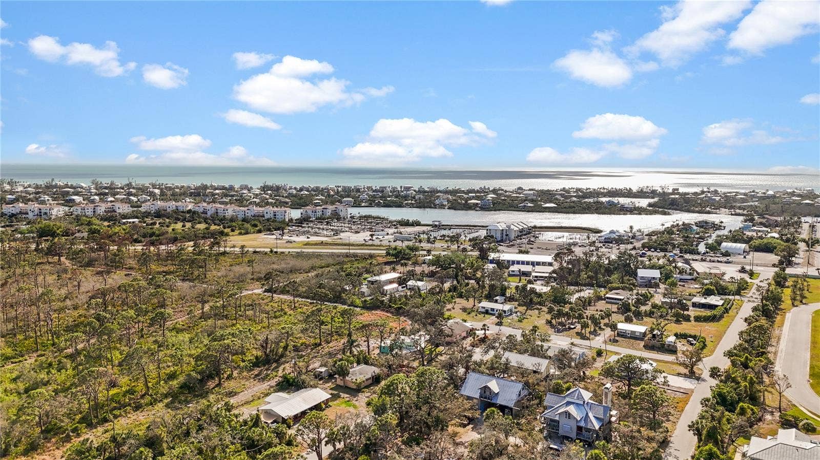 7035 DUKE STREET, Englewood, FL 34224 This is an aerial shot to give you and idea of where this home is situated in relation to the Gulf and marinas.