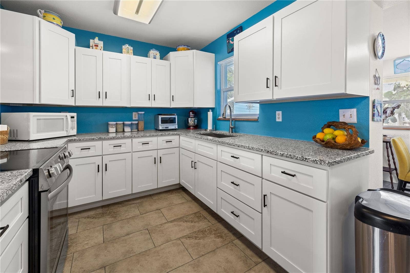 7035 DUKE STREET, Englewood, FL 34224 Here's another view of the kitchen.