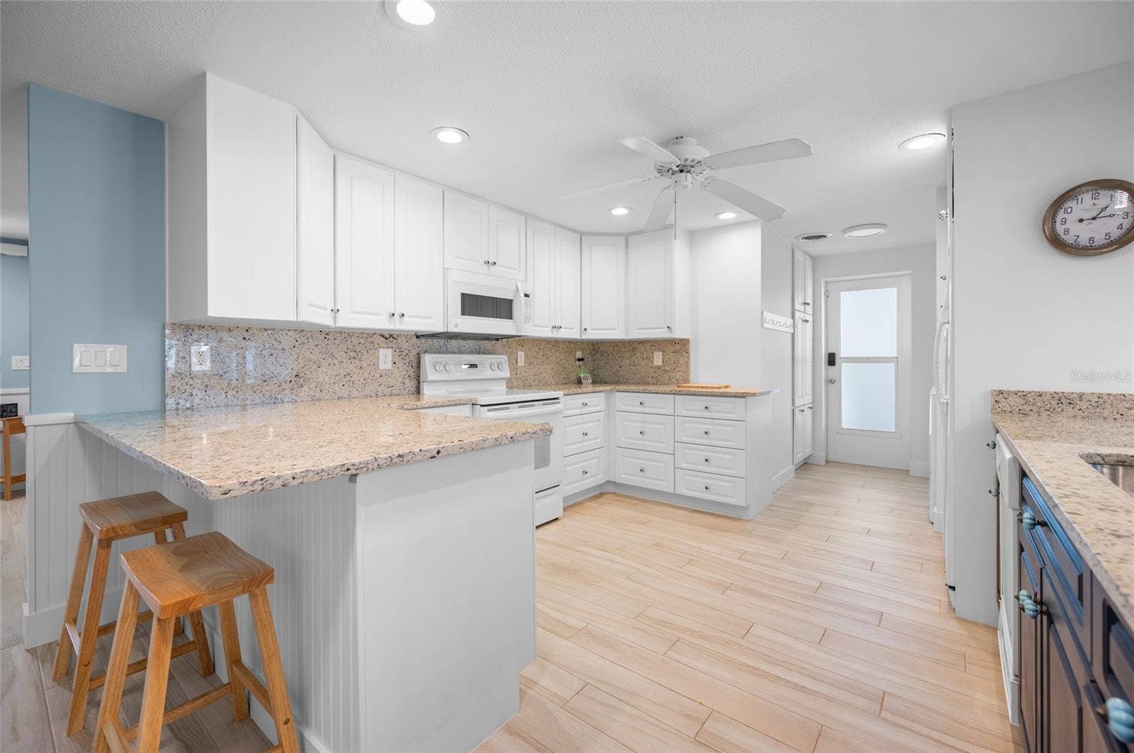 2111 HEASLEY ROAD, Englewood, FL 34223 Spacious kitchen with GRANITE COUNTER TOPS & BREAKFAST BAR